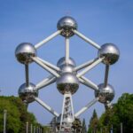 View of the Atomium in Brussels, Belgium, showcasing modern architecture under a clear sky.