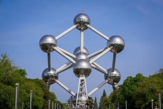 View of the Atomium in Brussels, Belgium, showcasing modern architecture under a clear sky.
